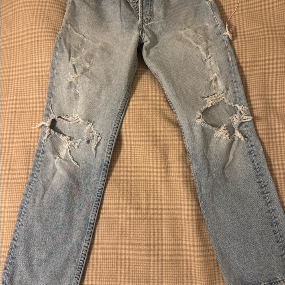 Vintage 501 Levi’s Distressed Women’s Light Blue Jeans w/ fun repairs size 28